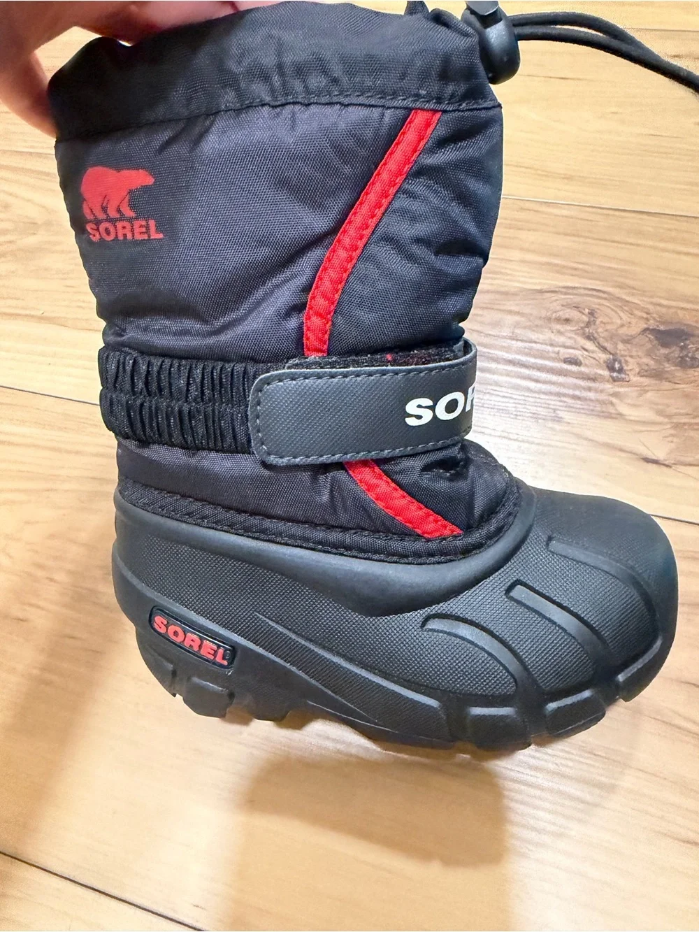 Sorel Kids Black Snow Boots with Red Accents